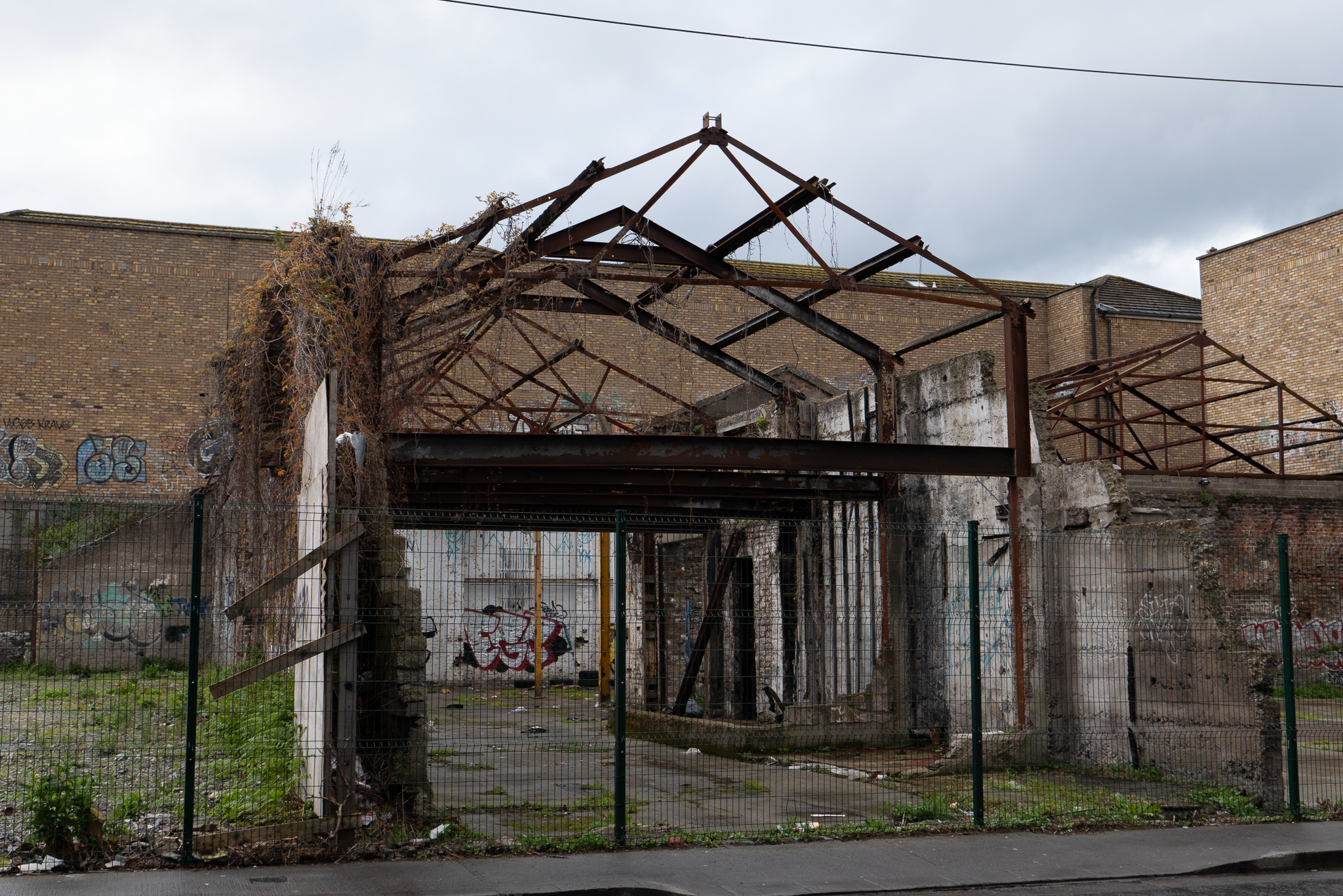 Interior steel support trusses exposed through demolition of the roof.